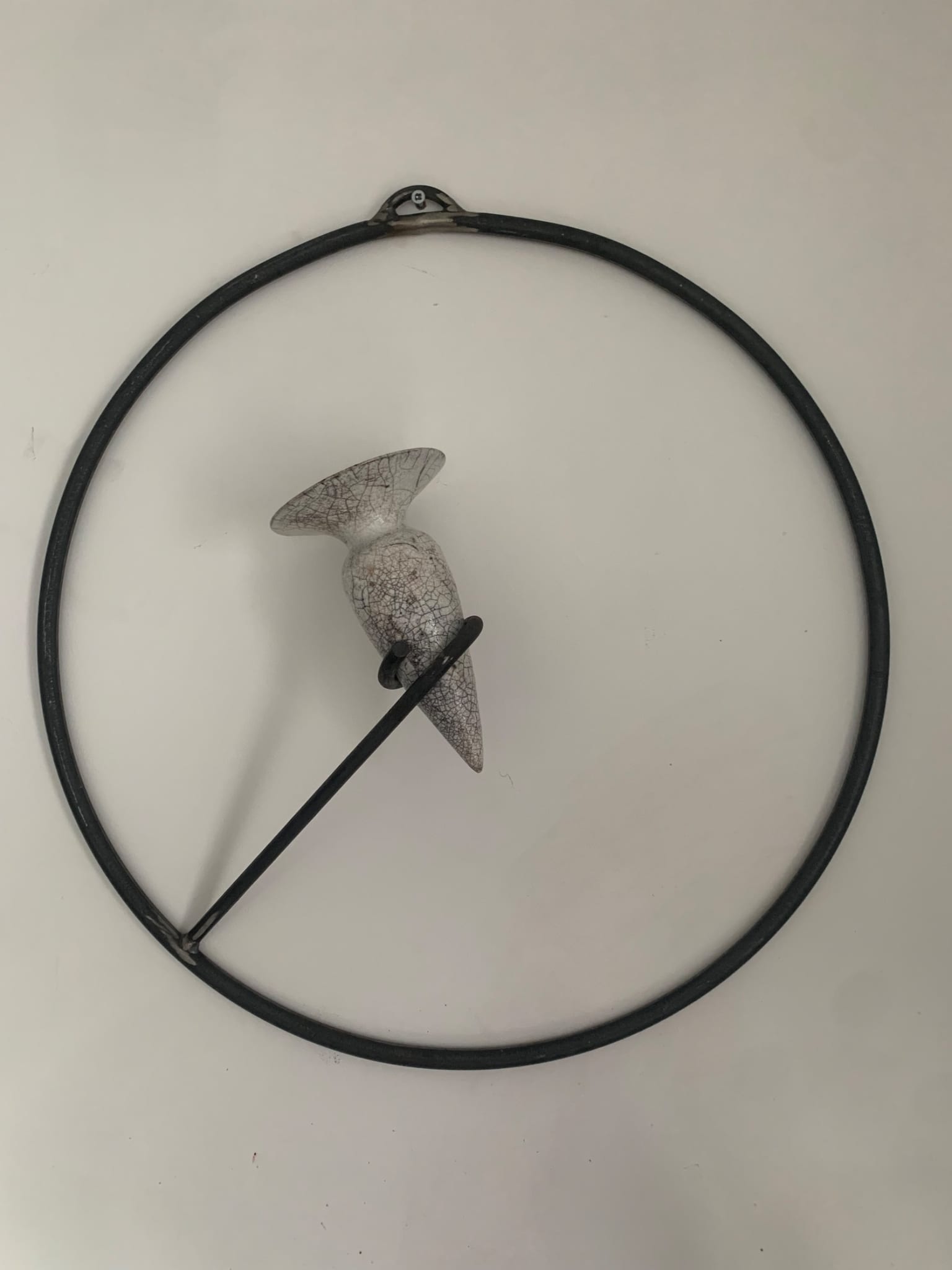 Raku Amphora in metal wall hanging stand.